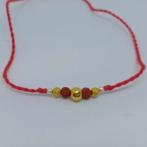 Gold Rakhi One Golden Ball And Two Rudraksha Design