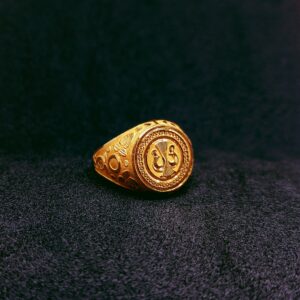 Gold round with design ring