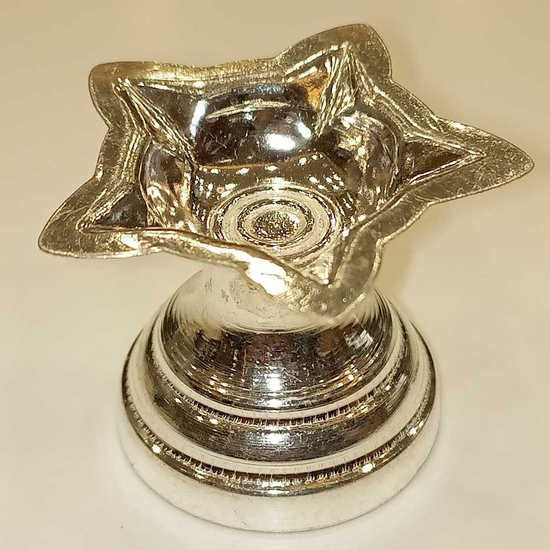 Silver star shape diya