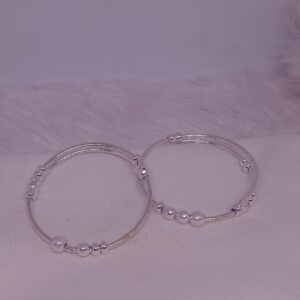 silver bol and simple baby's kada