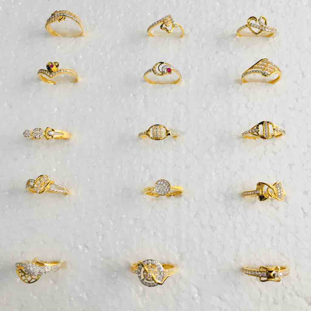 18KT Gold Fancy CZ Ladies Ring Designs