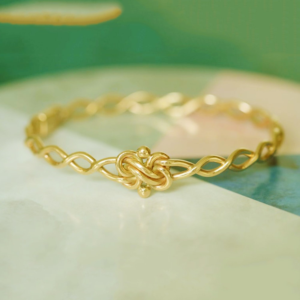 18 kt yellow gold lover's knot twist women's bracelet bangle 20 grams