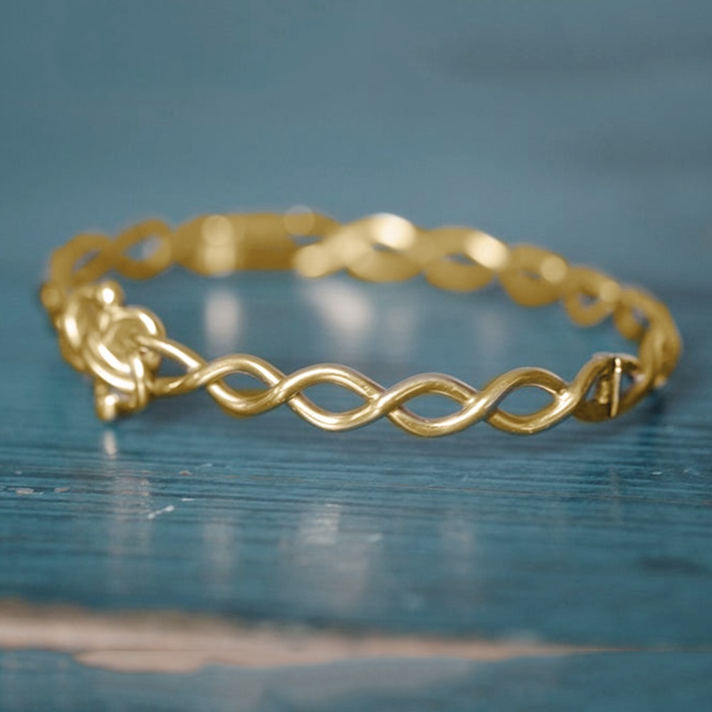 18 kt yellow gold lover's knot twist women's bracelet bangle 20 grams