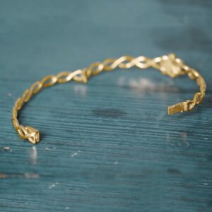 18 kt yellow gold lover's knot twist women's bracelet bangle 20 grams