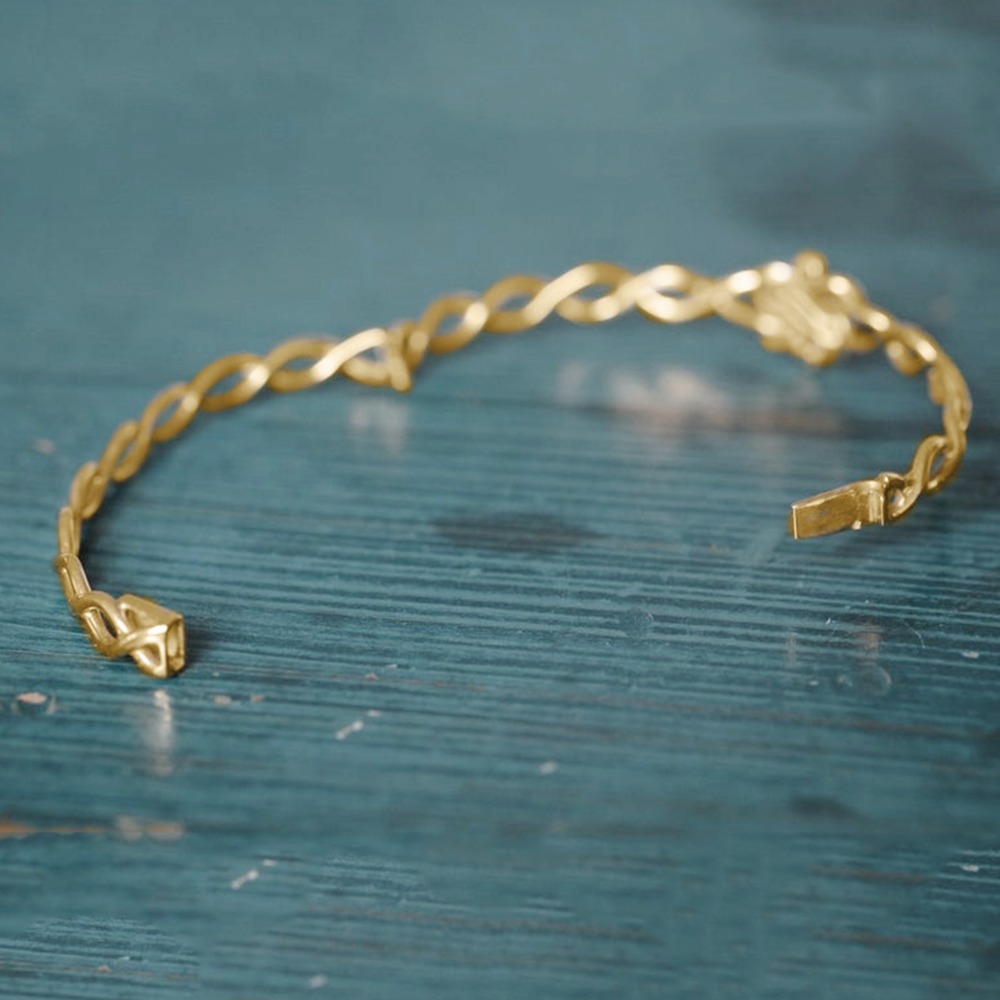 18 kt yellow gold lover's knot twist women's bracelet bangle 20 grams
