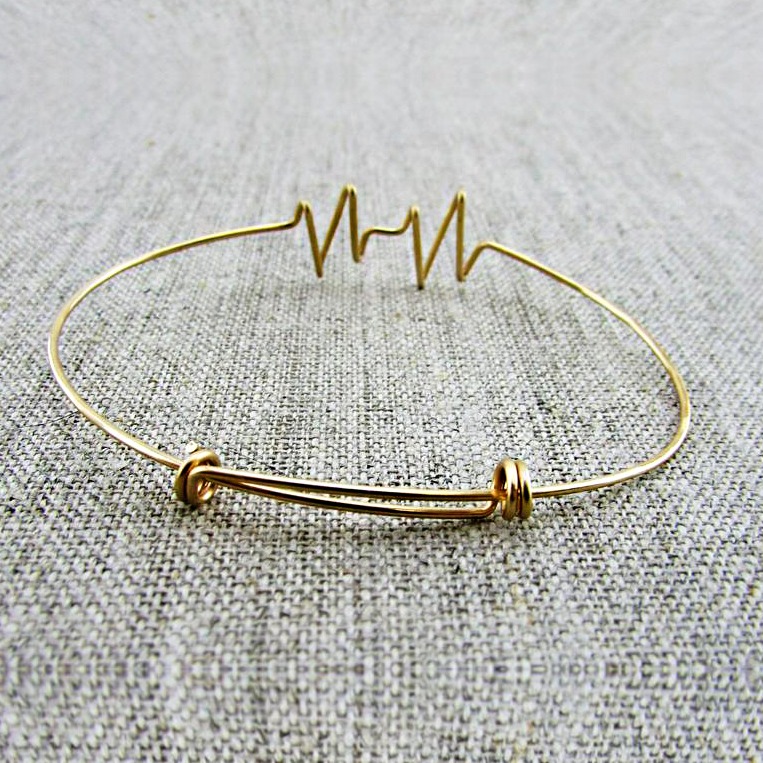 18 kt solid yellow gold adjustable heartbeat bangle bracelet