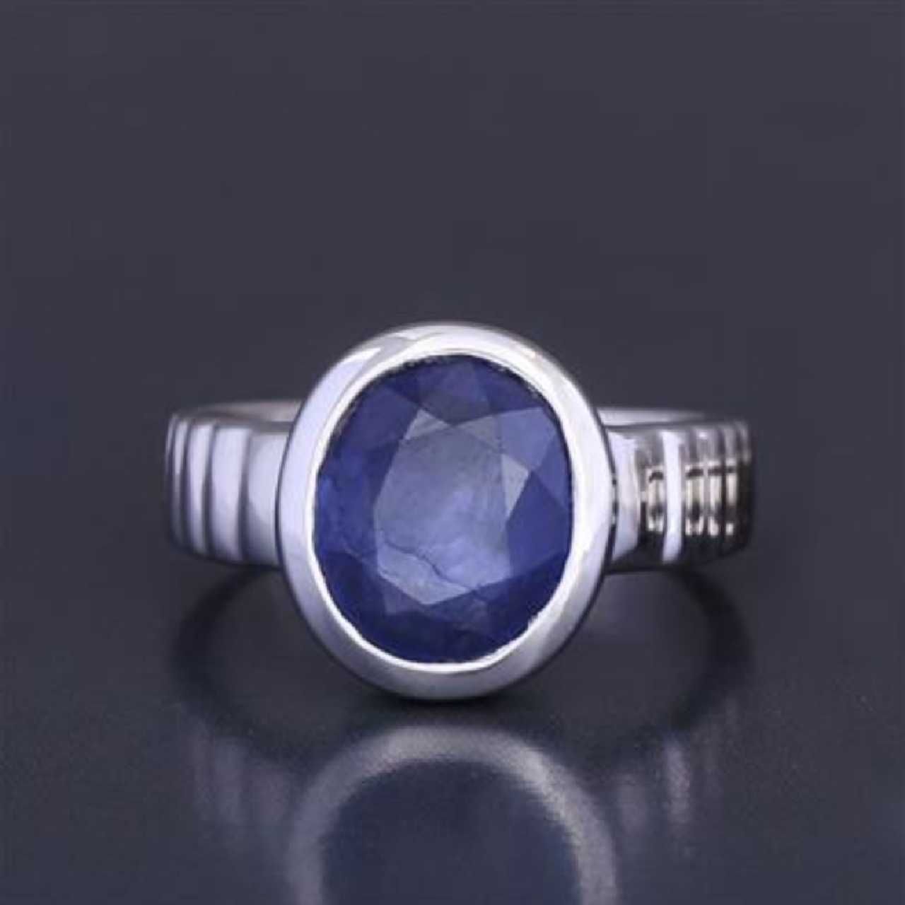 5.25 ratti blue sapphire (neelam) ring in rhodium flash sterling silver
