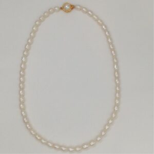 Freshwater white oval pearls strand JPM0082