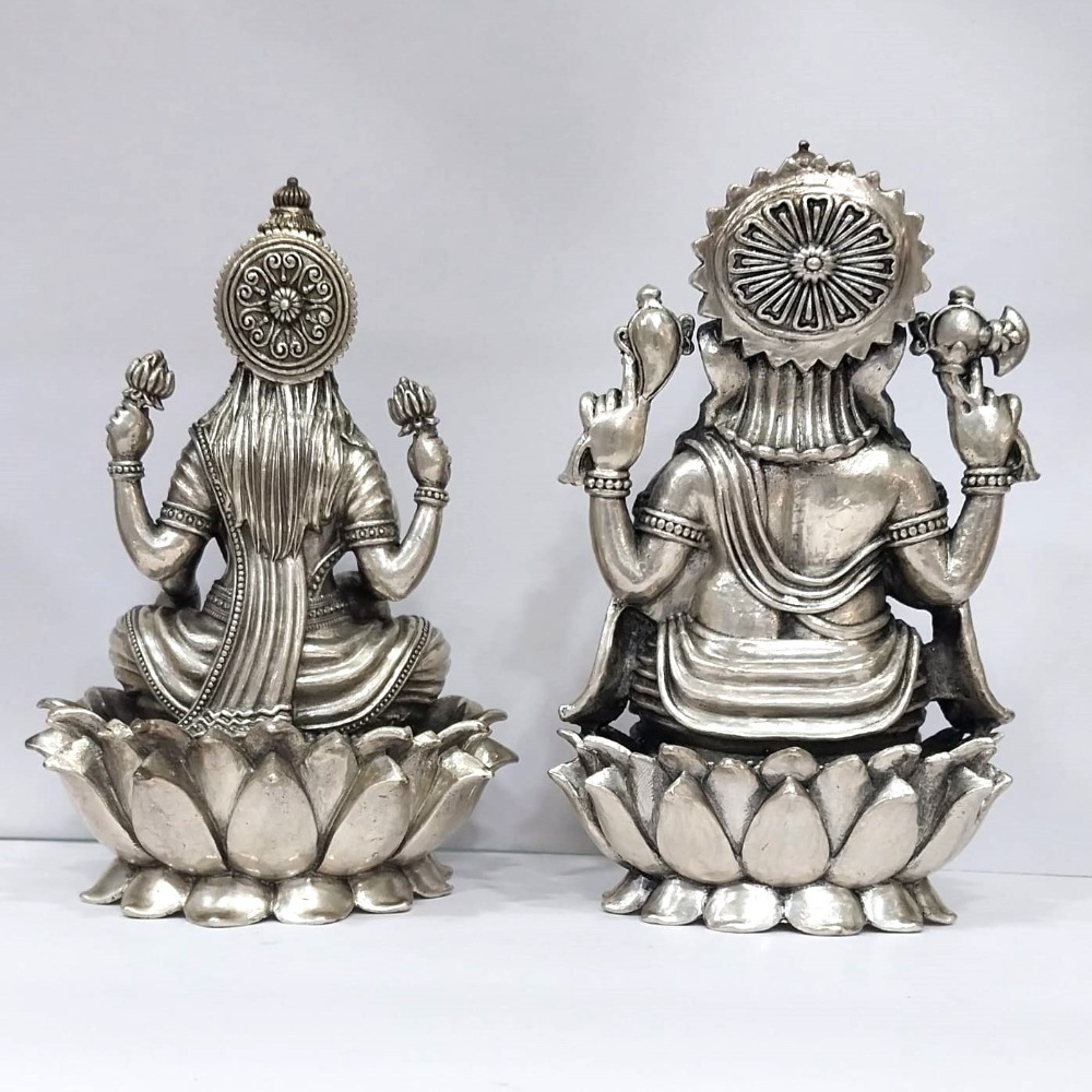 Blissful Pure silver lakshmi ganesh idols On Lotus in high finishing