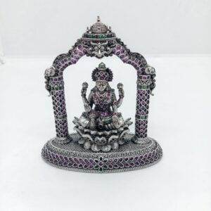Unique idol of goddess laxmi in pure silver sitting on a lotus