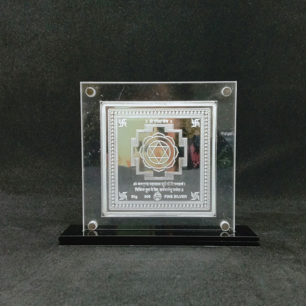 Real silver designer coin of ganesha in color printing and yantra