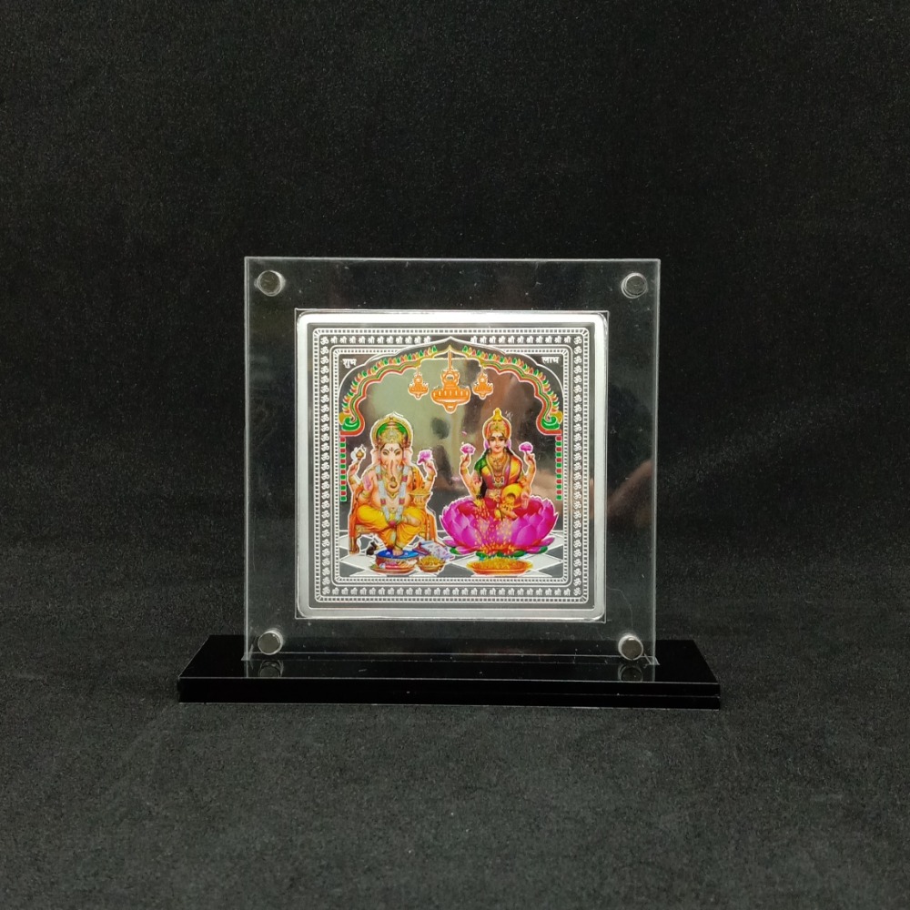 Hallmarked silver designer coin of laxmi ganesh in color printing