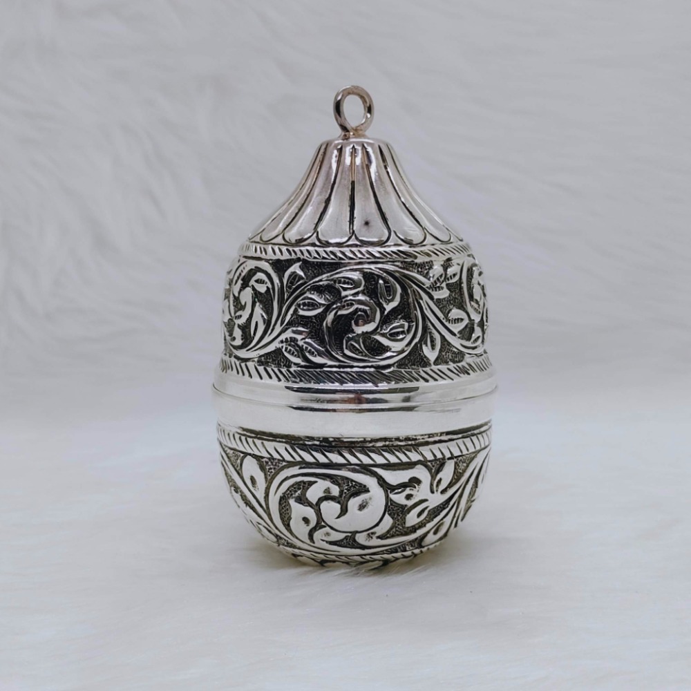 Real silver nariyal in antique carvings for pujan and by puran