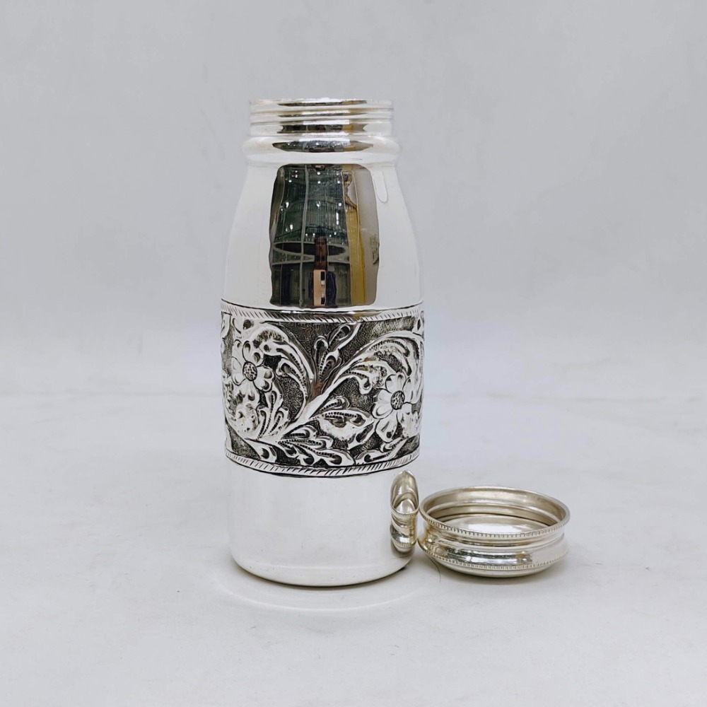 Real silver bottle in fine antique centre floral design carvings