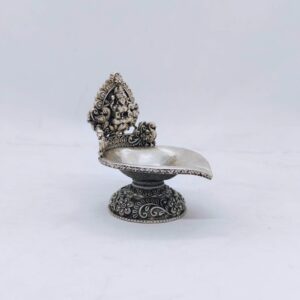 Hallmarked silver kamakshi lamp with peacocks in antique finish