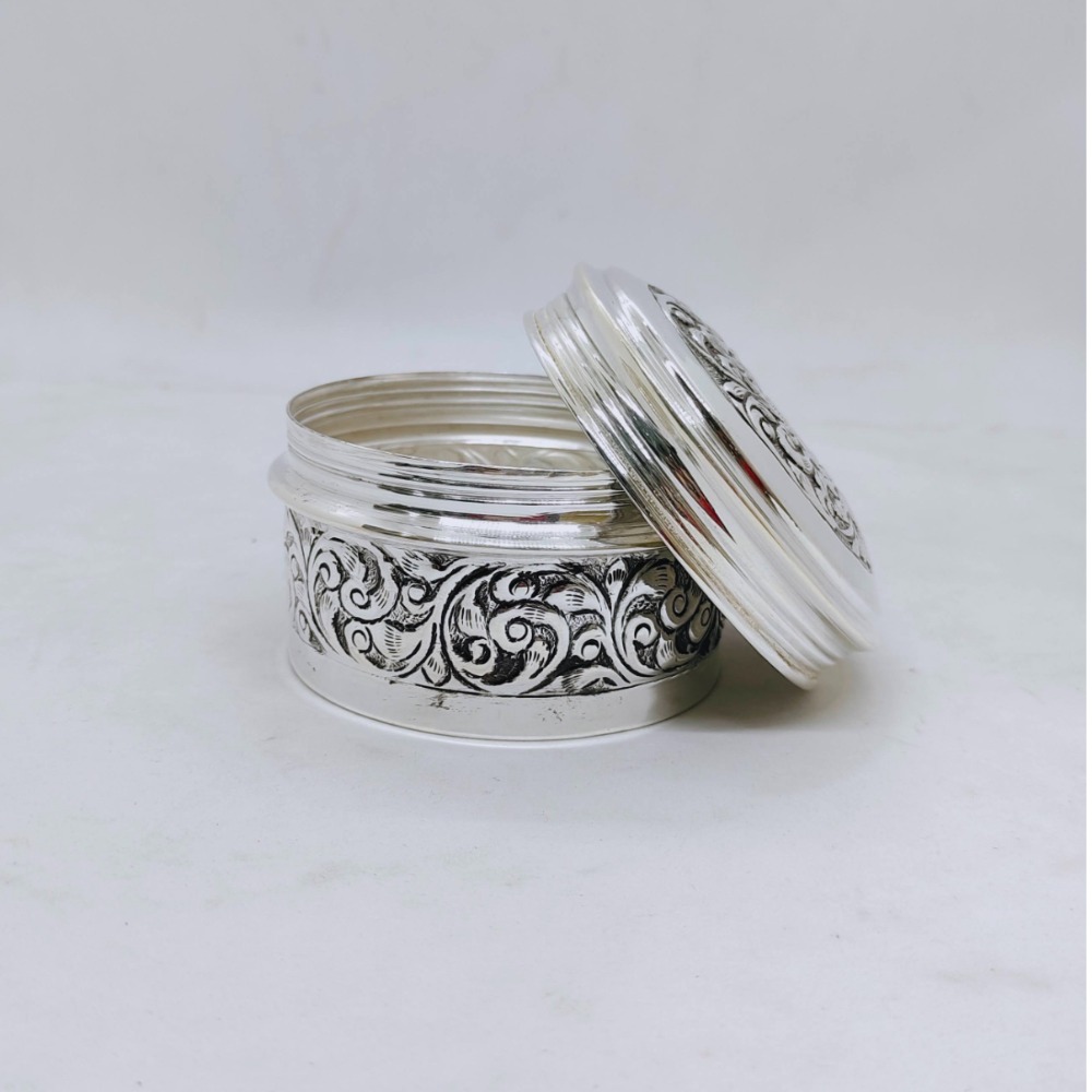 Hallmarked silver box for gifting in antique rounded shape carving