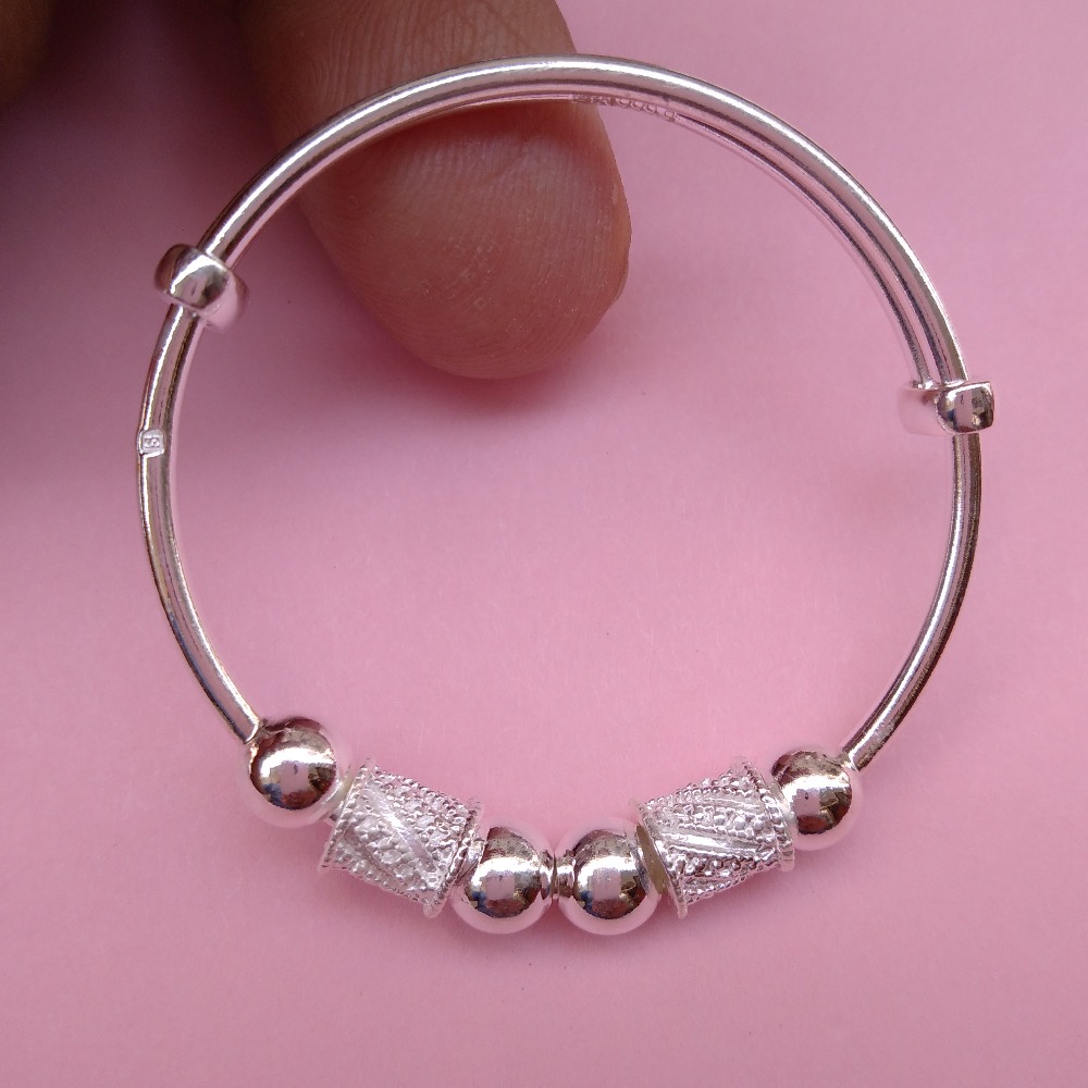 Puran pure silver baby kada with hollow balls & drum charms (1 pair)