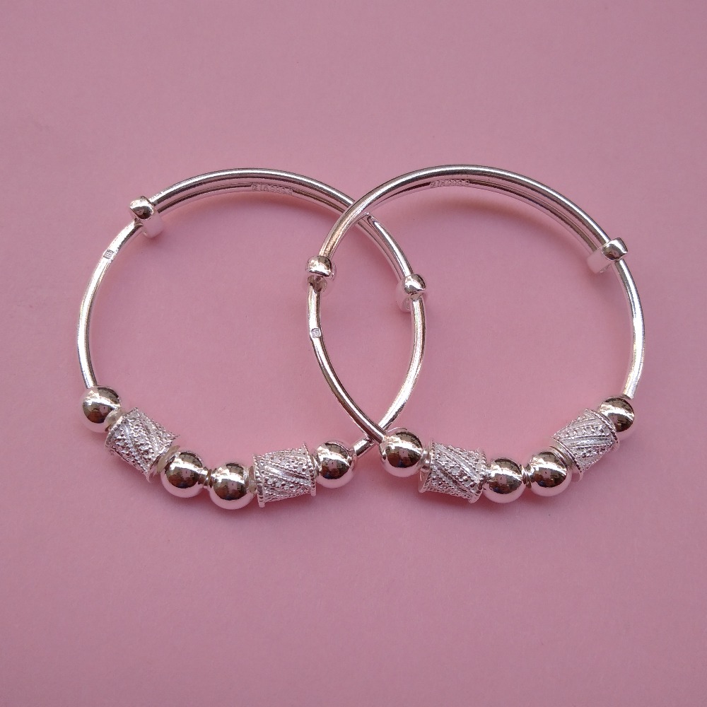 Puran pure silver baby kada with hollow balls & drum charms (1 pair)