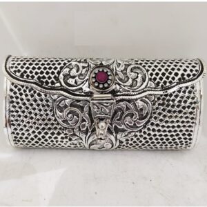 maanniya pure silver clutch in net motifs n gemstone