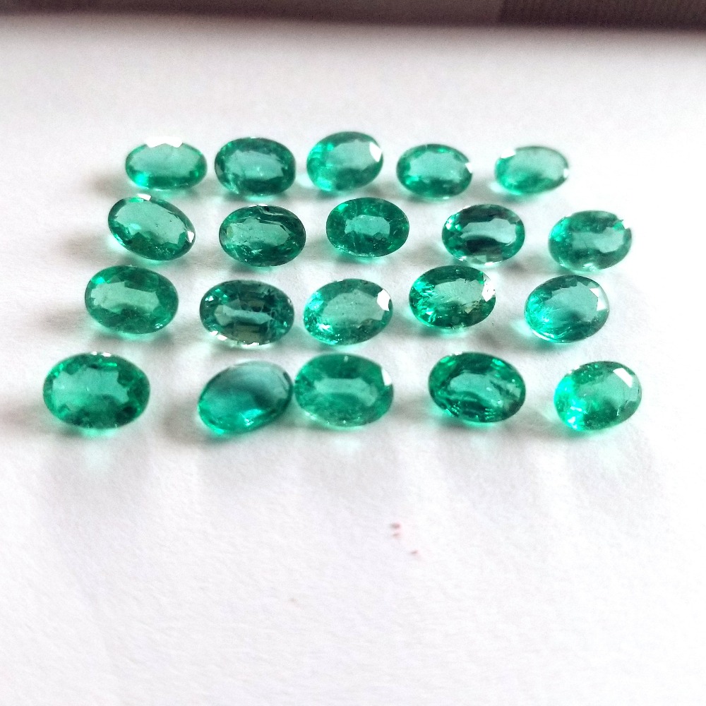 13.95ct oval green emerald-panna