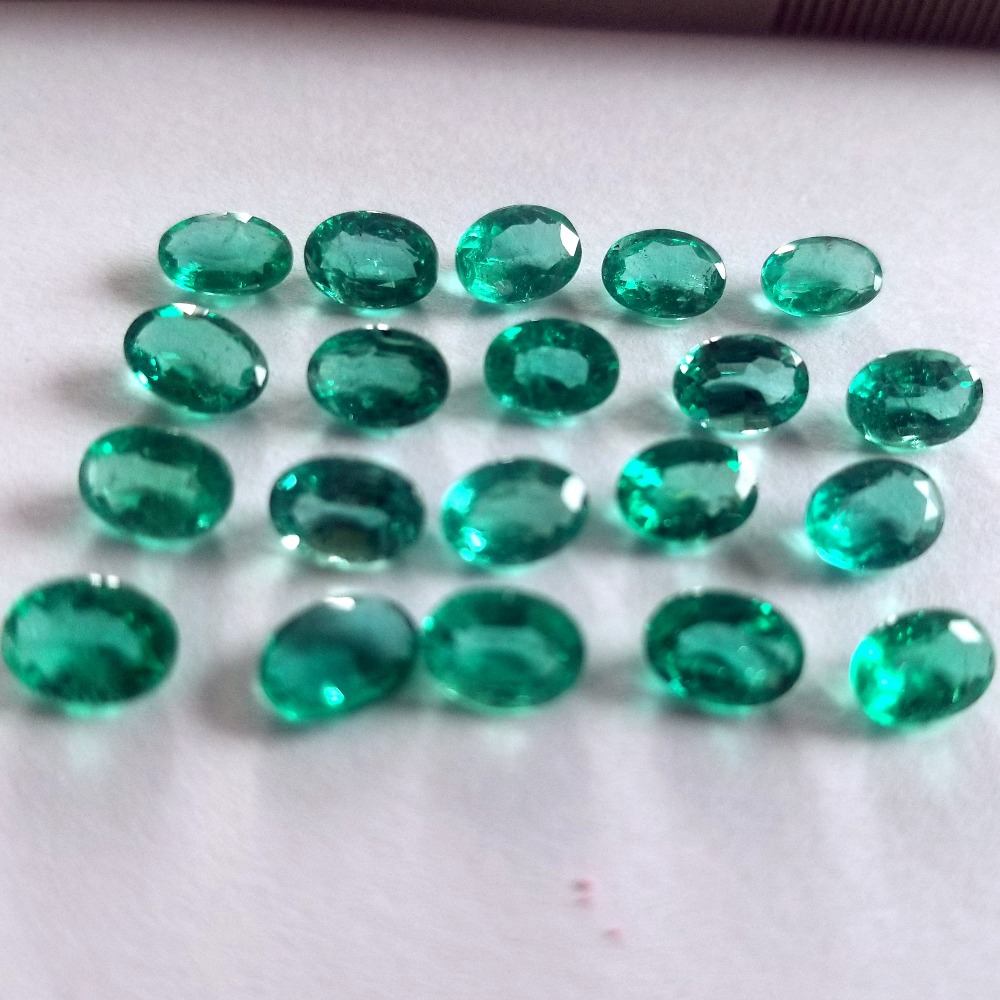 13.95ct oval green emerald-panna