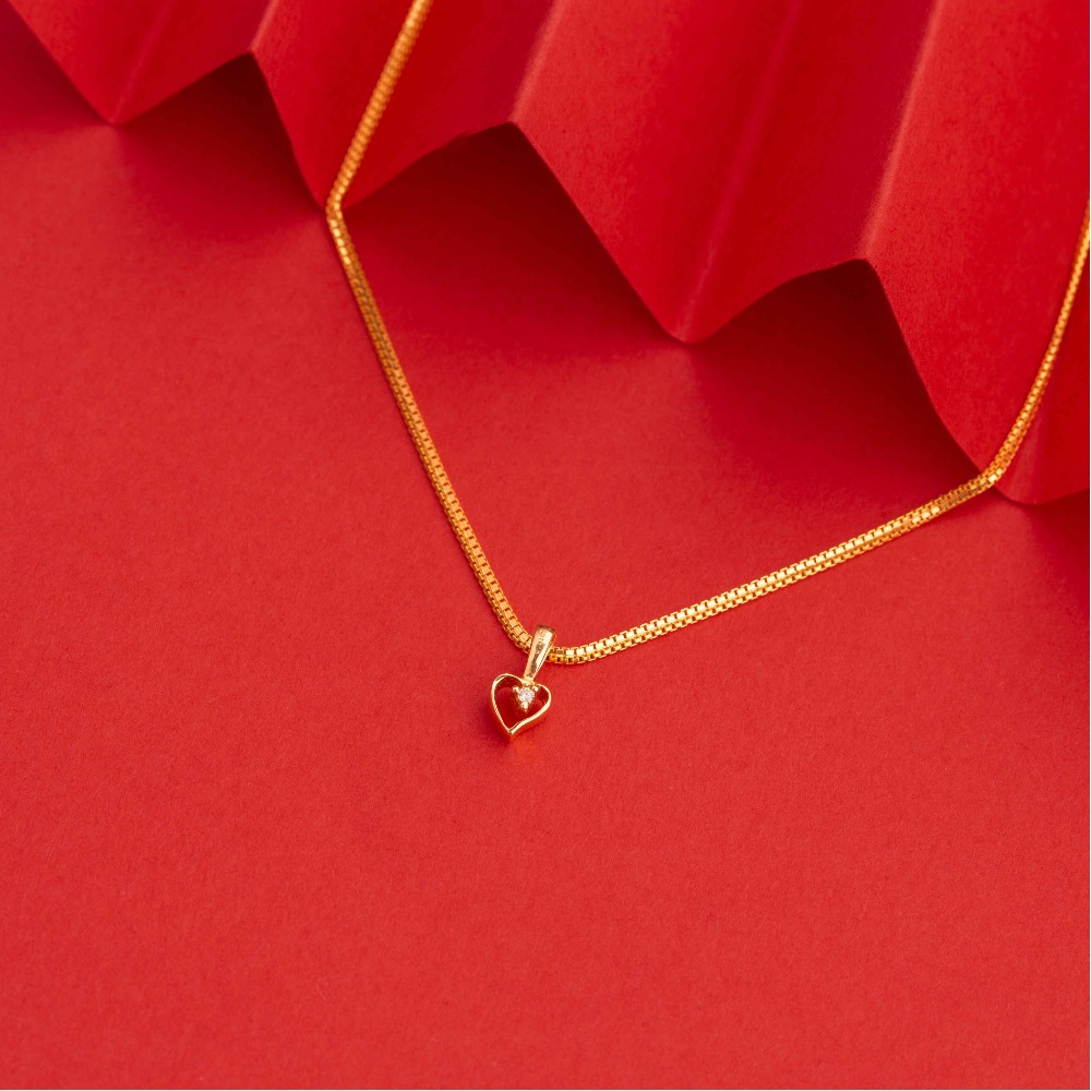 Delicate rose gold heart pendant