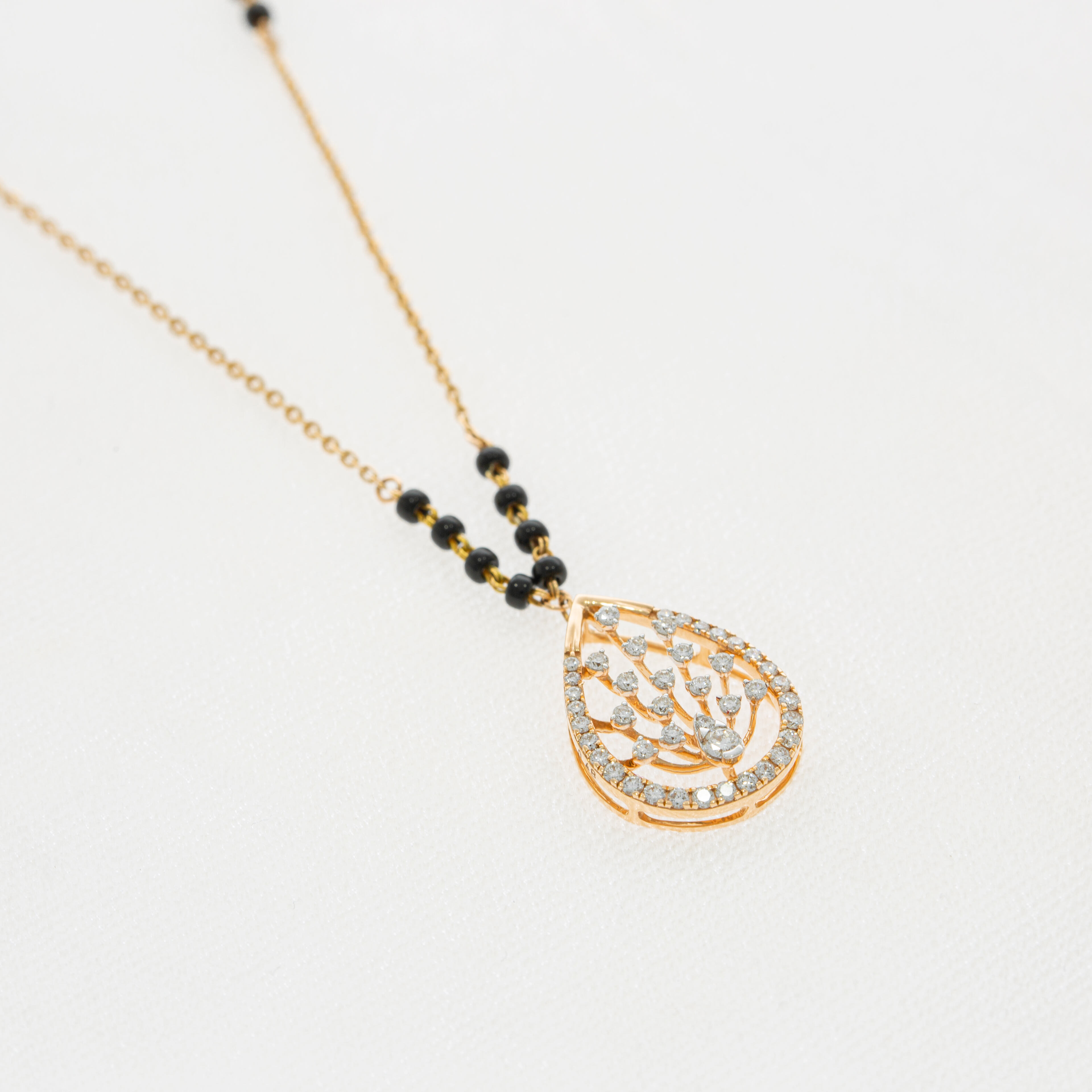 18kt diamond droplet short mangalsutra in rosegold