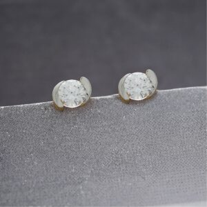 swirling gold studs