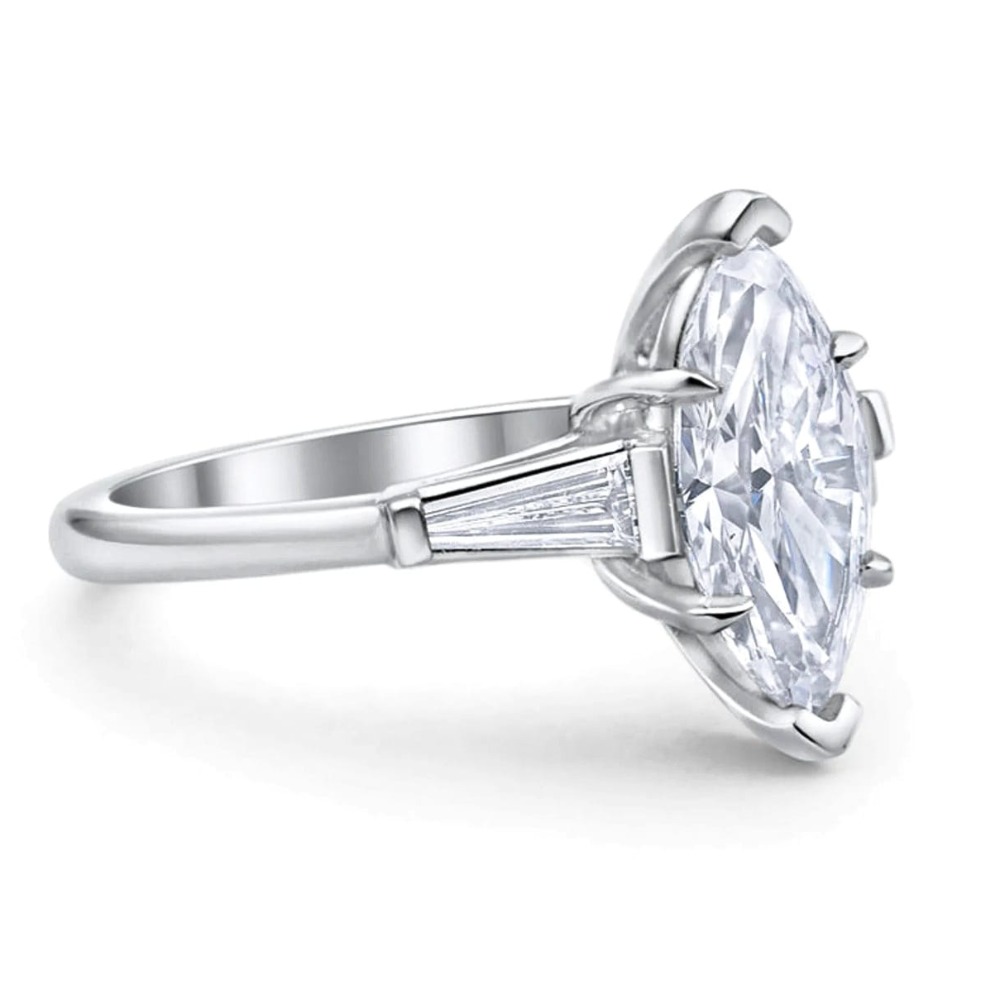 Fancy shape moissanite diamond ring .