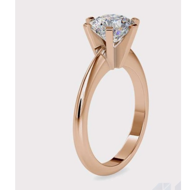 13.56 gms 18k gold and platinum ring with 0.54 ct. diamonds prongs