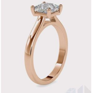 0.67 ct. round and princess diamond prongs and 3.28 gms unisex ring