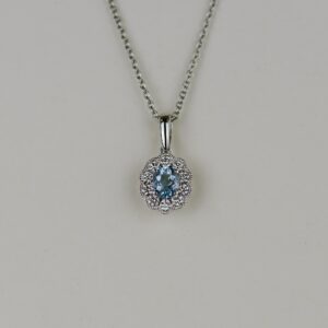 18ct White Gold 0.32ct Oval Aquamarine and Diamond Cluster Pendant