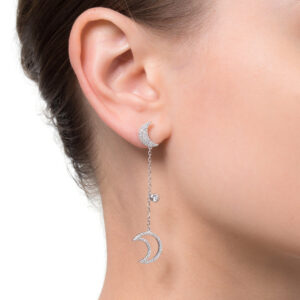 Silver and cubic zirconia moon earrings.