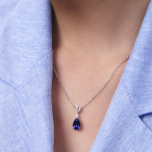 Wings Over Water Pear Tanzanite and Diamond Wave Detail Pendant
